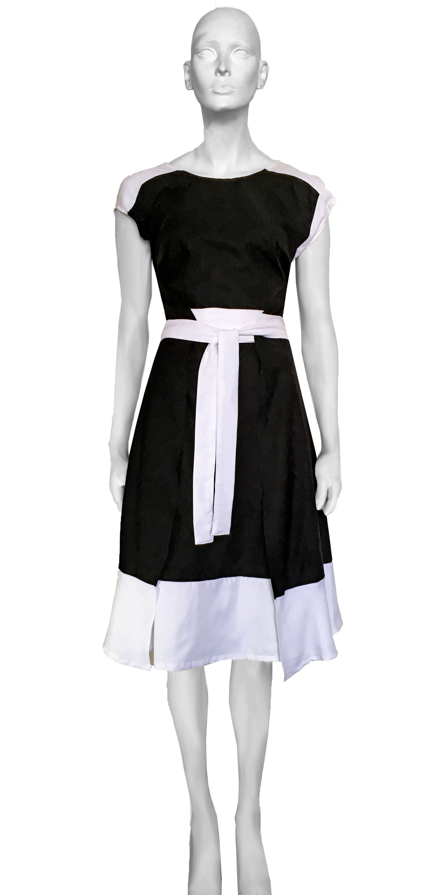 Wrap dress, two fronts, with white shoulder yoke and skirt.