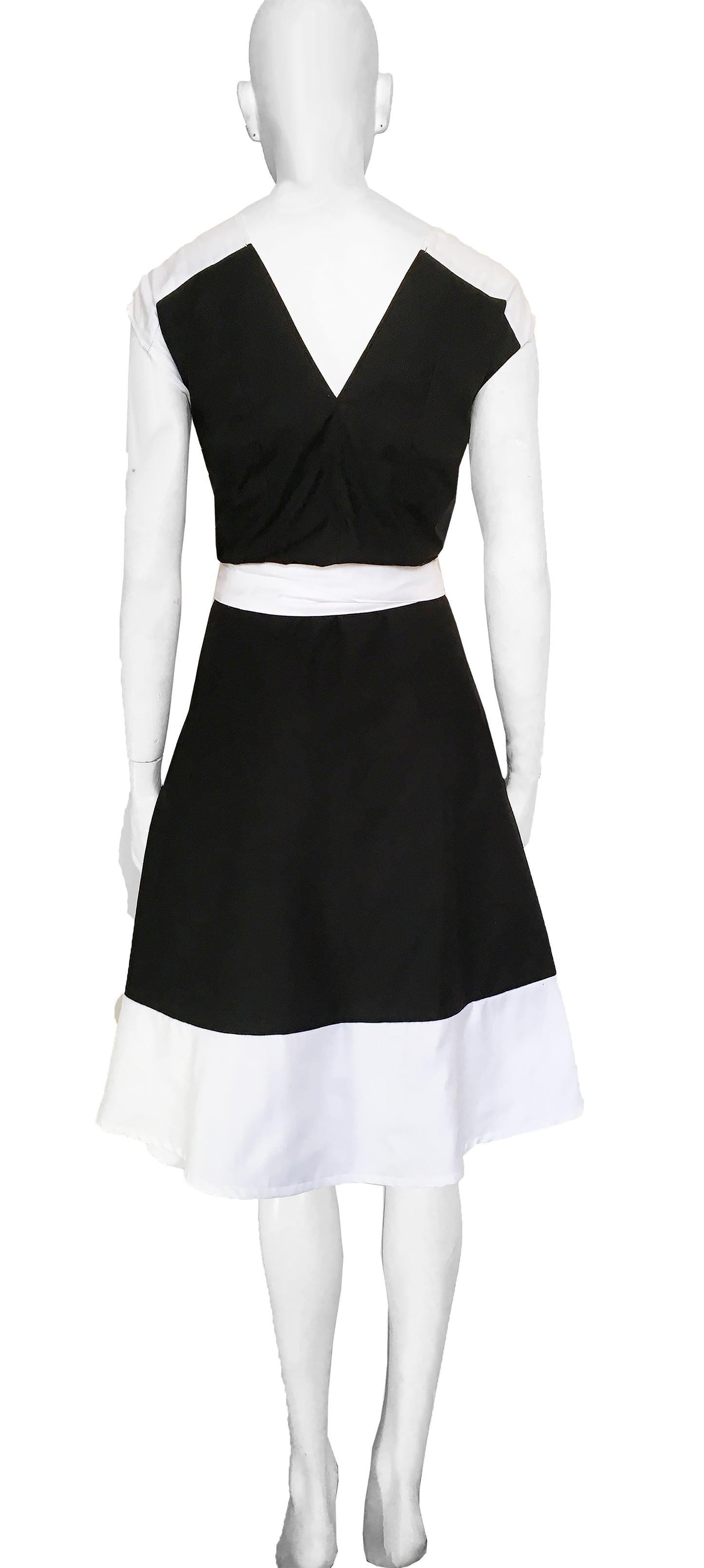 Wrap dress, two fronts, with white shoulder yoke and skirt.