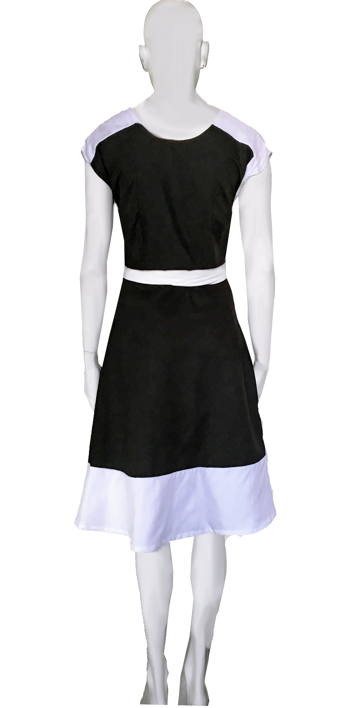 Wrap dress, two fronts, with white shoulder yoke and skirt.