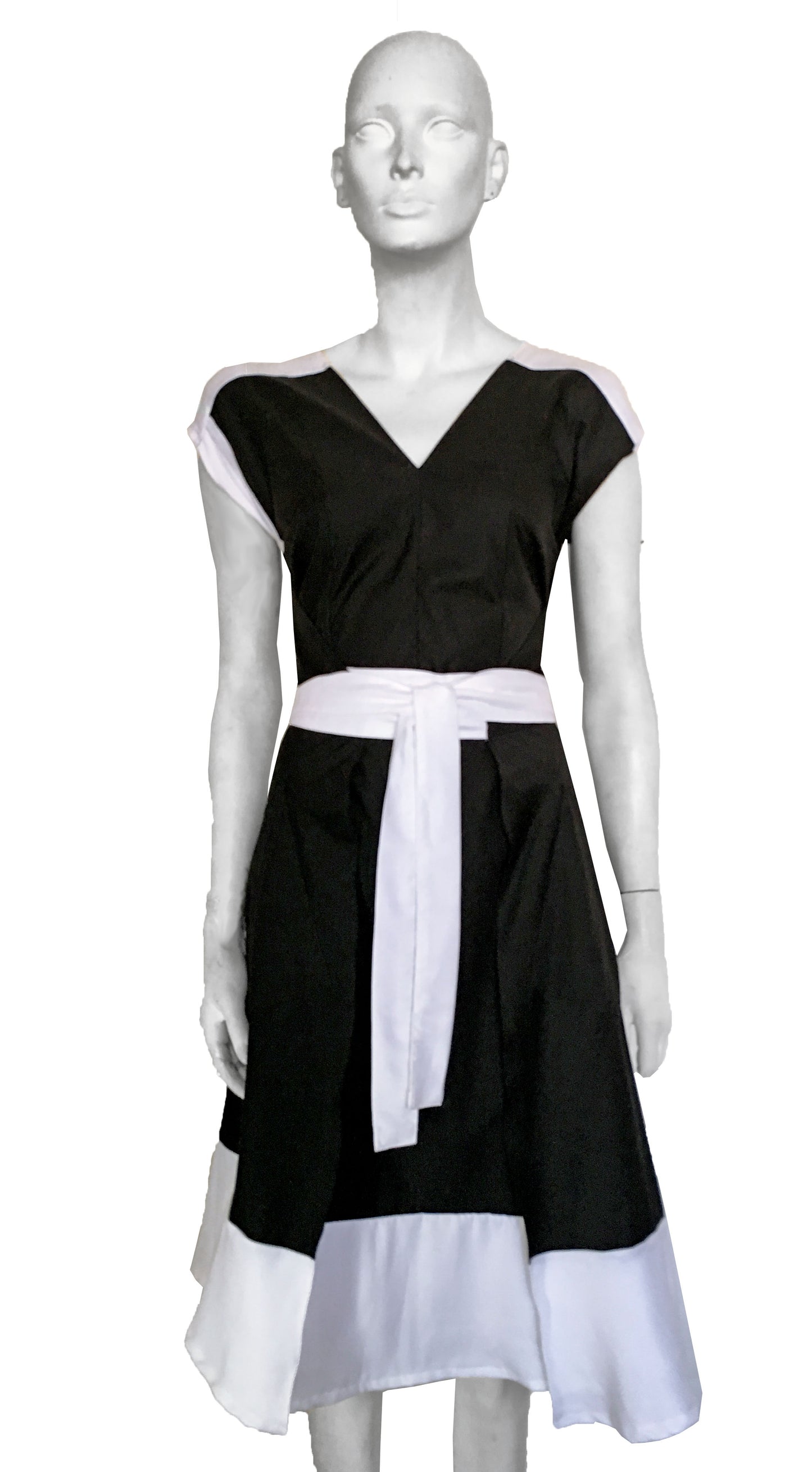 Wrap dress, two fronts, with white shoulder yoke and skirt.